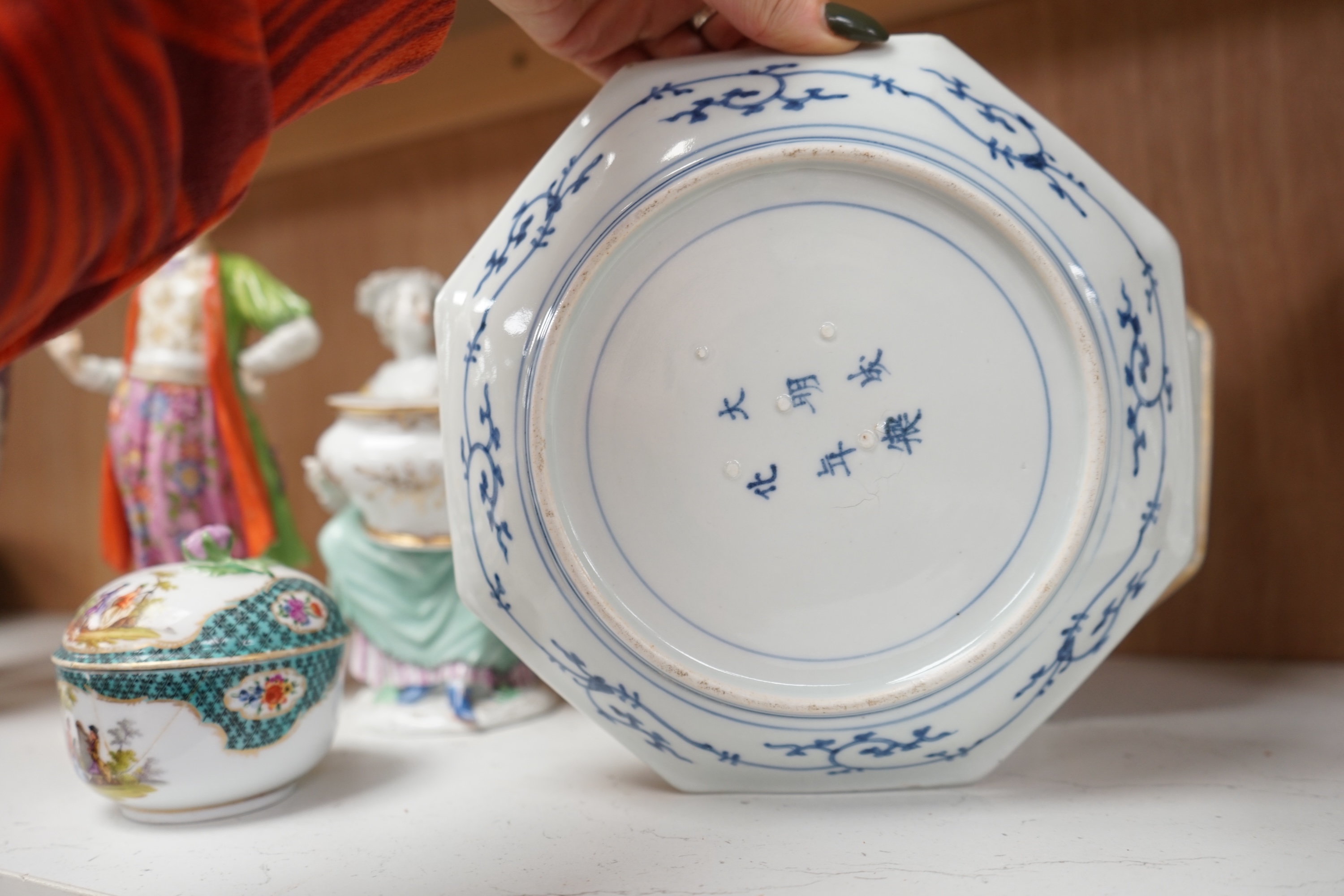 A group of various ceramics to include a Berlin floral decorated vase, a pair of Meissen dishes, similar box and cover, figural sweetmeat and figure of a Turk, together with a pair of Japanese Imari dishes, tallest 33cm.